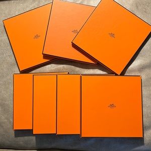 7 Hermes scarf boxes with minor scratches and 1 with mark on bottom.